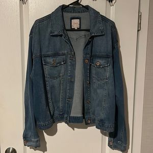 I’m selling a pre-owned candie’s jean jacket, a perfect cover up for dresses